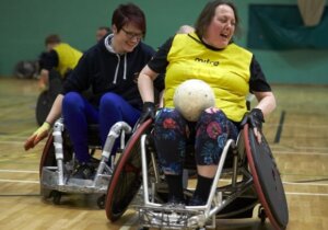 Women's wheelchair rugby game in action