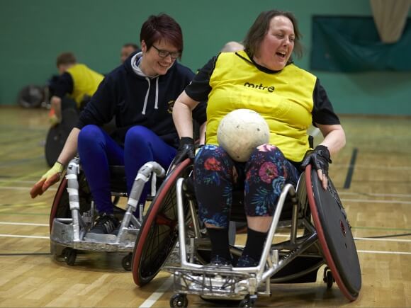 Women's wheelchair rugby game in action