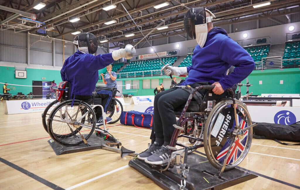 Wheelchair fencers on action