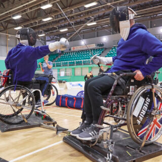 Wheelchair fencers on action