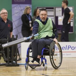 wheelchair cricket action shot