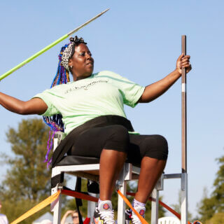 seated thrower with a javelin