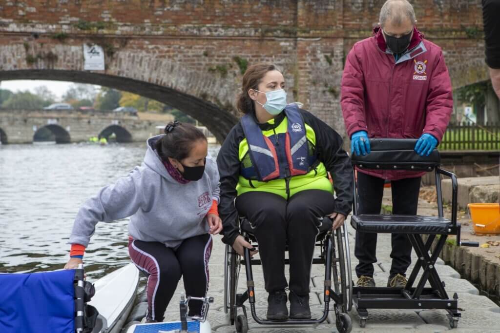 Drew Smith at Stratford Rowing Club by the side of the boat