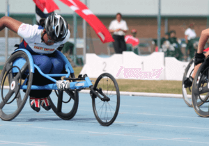 Wheelchair racer on the track during a 100m competition