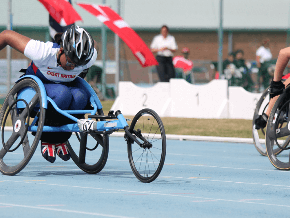 Wheelchair racer on the track during a 100m competition