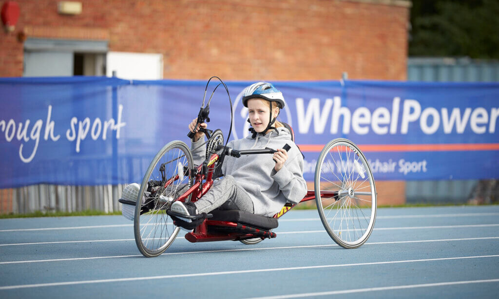 Hand cyclist in action