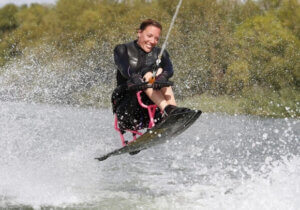 seated wakeboarder in action
