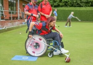 Wheelchair bowler in action