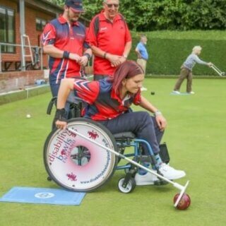Wheelchair bowler in action