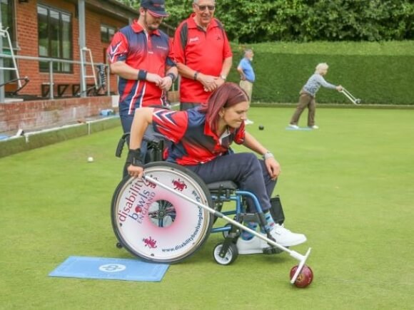 Wheelchair bowler in action