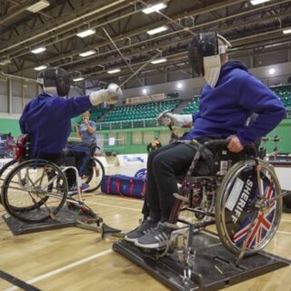 Wheelchair fencers on action