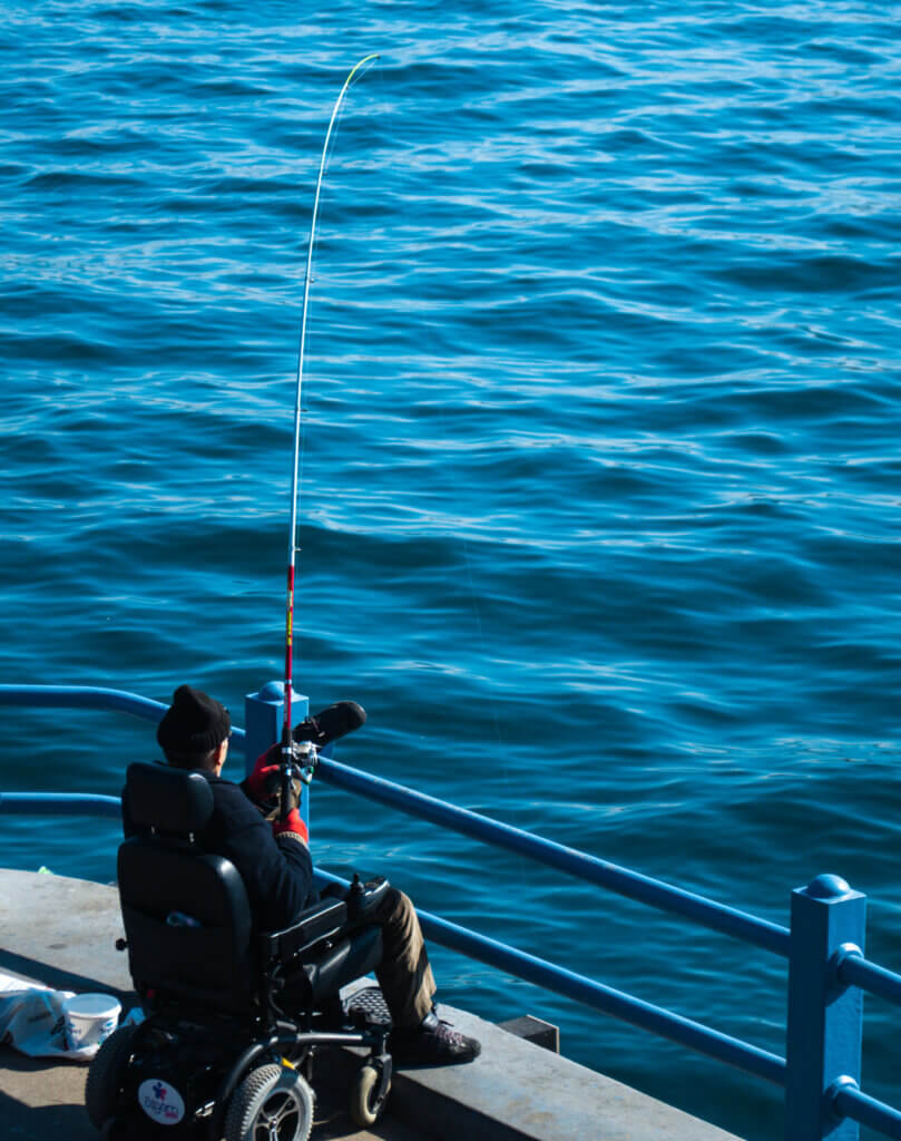 Wheelchair user fishing