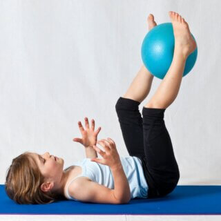 Child doing gymnastics