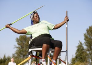 Helen participating in a seated throw javelin competition