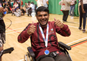 Junior athlete celebrating at the WheelPower National Junior Games