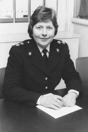 A young Inspector Mills